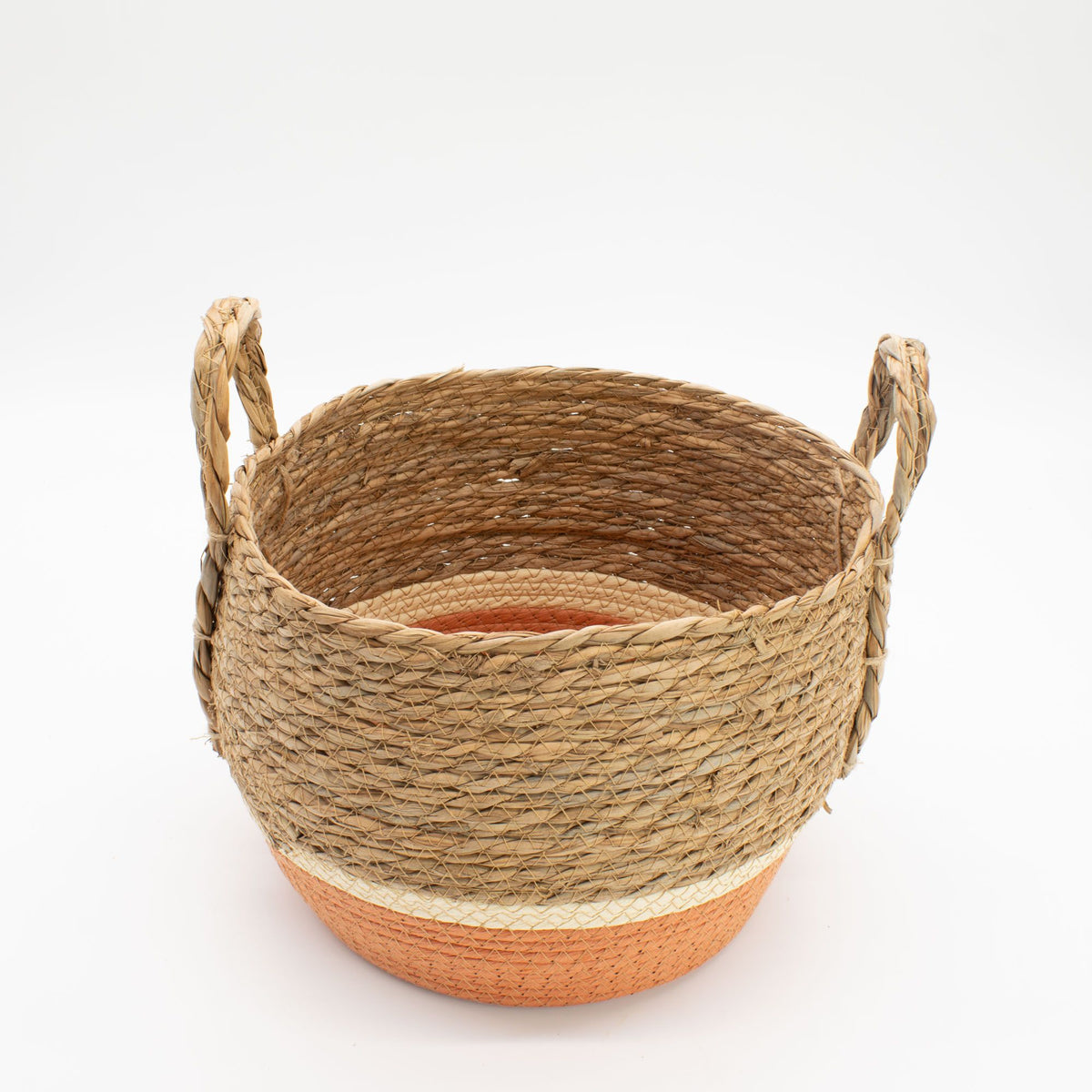 Woven basket with a two-tone design on a white background